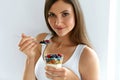 Healthy Breakfast. Woman With Glass Of Yogurt, Berries And Oats Royalty Free Stock Photo