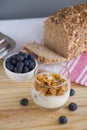 Healthy Breakfast: yogurt with blueberries and corn cereals and h Royalty Free Stock Photo