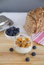 Healthy Breakfast: yogurt with blueberries and corn cereals and h Royalty Free Stock Photo