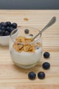 Healthy Breakfast: yogurt with blueberries and corn cereals Royalty Free Stock Photo