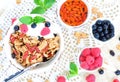 Healthy breakfast, yogurt with granola and berries on the white table Royalty Free Stock Photo