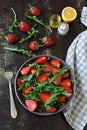 Healthy bright arugula salad strawberry. Vegan Salad.