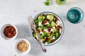 healthy broccoli salad with feta cheese sun dried tomatoes pine nuts.. vegetarian low carb keto diet