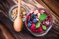 Healthy brunch with fruits and granola, served in jar