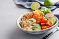 Healthy buddha bowl with chicken, quinoa and fresh vegetables