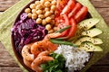 Healthy Buddha bowl with raw vegetables, shrimp, chickpeas, rice Royalty Free Stock Photo