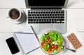 Healthy business lunch snack in office, vegetable salad top view