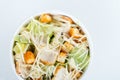 Fresh healthy caesar salad. on white background. Top view Royalty Free Stock Photo