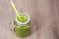 Healthy carrot smoothie in a jar on wooden background Royalty Free Stock Photo