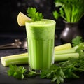 Healthy celery drink in a glass glass on a dark background