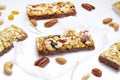 Healthy cereal granola bars with nuts and dry berries close up. Royalty Free Stock Photo