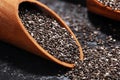 Healthy Chia seeds in a wooden spoon on the table close-up Royalty Free Stock Photo