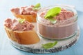 Healthy chicken liver pate with sage in jar and on bread Royalty Free Stock Photo