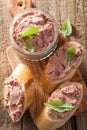 Healthy chicken liver pate with sage in jar and on bread Royalty Free Stock Photo