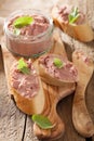 Healthy chicken liver pate with sage in jar and on bread Royalty Free Stock Photo