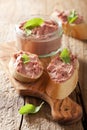 Healthy chicken liver pate with sage in jar and on bread Royalty Free Stock Photo