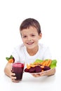 Healthy child with fresh beetroot juice
