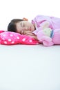 Healthy children concept. Asian girl sleeping peacefully. Isolated on white background. Royalty Free Stock Photo