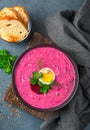 Healthy, chilled beetroot soup made from potatoes, beets, cucumbers, eggs, fresh herbs and kefir. A traditional