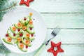 Healthy Christmas appetizer snack - avocado salmon cranberry Christmas tree Royalty Free Stock Photo