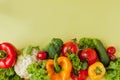 Healthy clean eating layout, vegetarian food and diet nutrition concept. Various fresh vegetables ingredients for salad on yellow Royalty Free Stock Photo