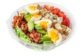 Healthy cobb salad in plastic package for take away or food delivery isolated on white background. close up Royalty Free Stock Photo