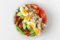 Healthy cobb salad in plastic package for take away or food delivery on white background. top view Royalty Free Stock Photo