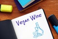 Healthy concept about Vegan Wine with sign on the page Royalty Free Stock Photo
