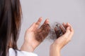 Healthy concept. Woman show her damaged long loss hair and looking at her hair on hand Royalty Free Stock Photo