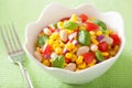 Healthy corn salad with tomato onion white bean basil