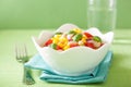 Healthy corn salad with tomato onion white bean basil