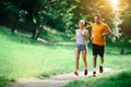 Healthy couple jogging in nature Royalty Free Stock Photo