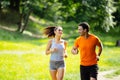 Healthy couple jogging in nature Royalty Free Stock Photo