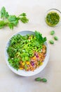 Healthy couscous salad with edamame beans, rucola and cucamelon