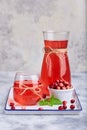 Healthy cranberry juice drink and fresh cranberries. Traditional Russian beverage mors