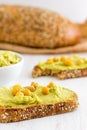 Healthy Creamy Avocado Hummus on Bread