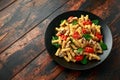 Healthy Creamy Hummus pasta with mushroom and roast tomatoes. vegan vegetarian, plant based. Royalty Free Stock Photo