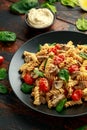 Healthy Creamy Hummus pasta with mushroom and roast tomatoes. vegan vegetarian, plant based. Royalty Free Stock Photo