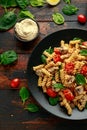 Healthy Creamy Hummus pasta with mushroom and roast tomatoes. vegan vegetarian, plant based. Royalty Free Stock Photo