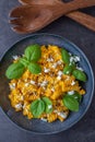 Creamy roasted pumpkin penne pasta on a table