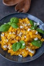 Creamy roasted pumpkin penne pasta on a table