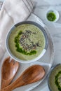 Healthy creamy soup with fresh ramson or wild garlic leaves