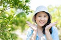 healthy cute teen girl plus size happy smiling at orange garden farm outdoor Royalty Free Stock Photo