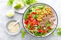 Healthy and delicious bowl with buckwheat and salad of chickpea, fresh pepper and lettuce leaves. Dietary balanced plant-based foo