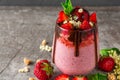 Healthy delicious breakfast. strawberry chia seed pudding with chocolate, fresh berries, granola, elderflowers and mint Royalty Free Stock Photo