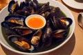 Healthy delicious seafood soup with mussels with cream sauce and herbs