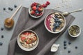 Healthy delicious smoothie bowls with fruits, berries and seeds. Top view