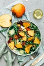 Healthy delicious winter salad with persimmon slices