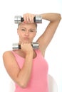 Healthy Determined Fit Young Woman Holding Dumb Bell Weights Pulling Expression Royalty Free Stock Photo