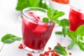 Healthy detox drink with goji berries infused in water with ice, cold refreshing beverage close-up Royalty Free Stock Photo